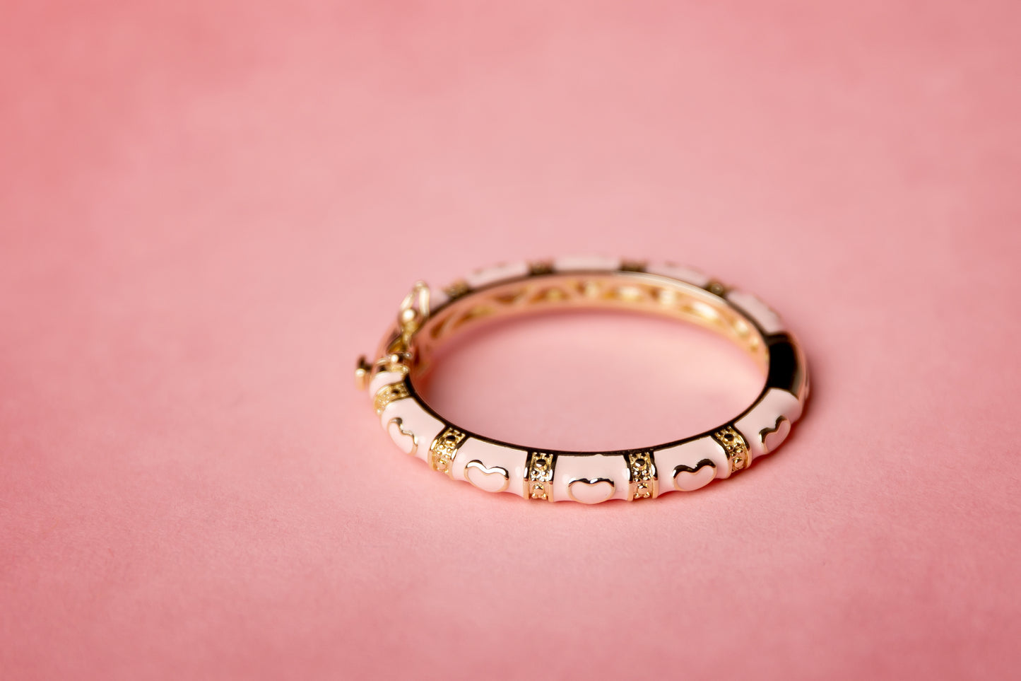 Gold plated pink bangle  with engraved design